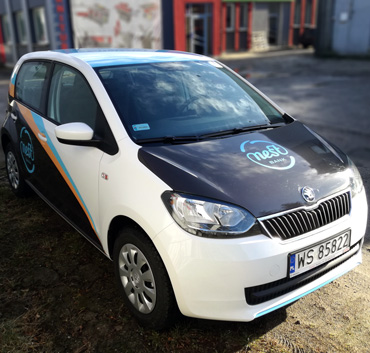 Nest bank samochód firmowy ozankowanie